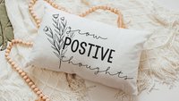 Grow positive thoughts throw pillow 