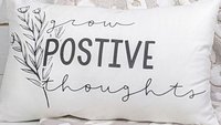 Grow positive thoughts throw pillow 