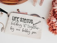 life status makeup bag