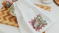making a list and checking it twice pink Christmas throw pillows for couch, leopard print Santa Claus kitchen towels, sage green Christmas