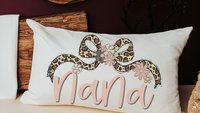 personalized blush pink nana throw pillow for bed, leopard print bow coquette pillow cover 12 by 20, mother in law mothers day gifts