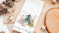 merry and bright kitchen towels for Christmas, blush pink Christmas tree hand towels for church, trending Christmas gifts for neighbors