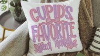 cupids favorite teacher throw pillows for women, funny Valentine classroom decor, Valentines day best selling gifts Etsy shops, preschool