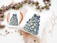 CapableByDesign oyster shell Christmas tree with navy bow pillows and matching towels