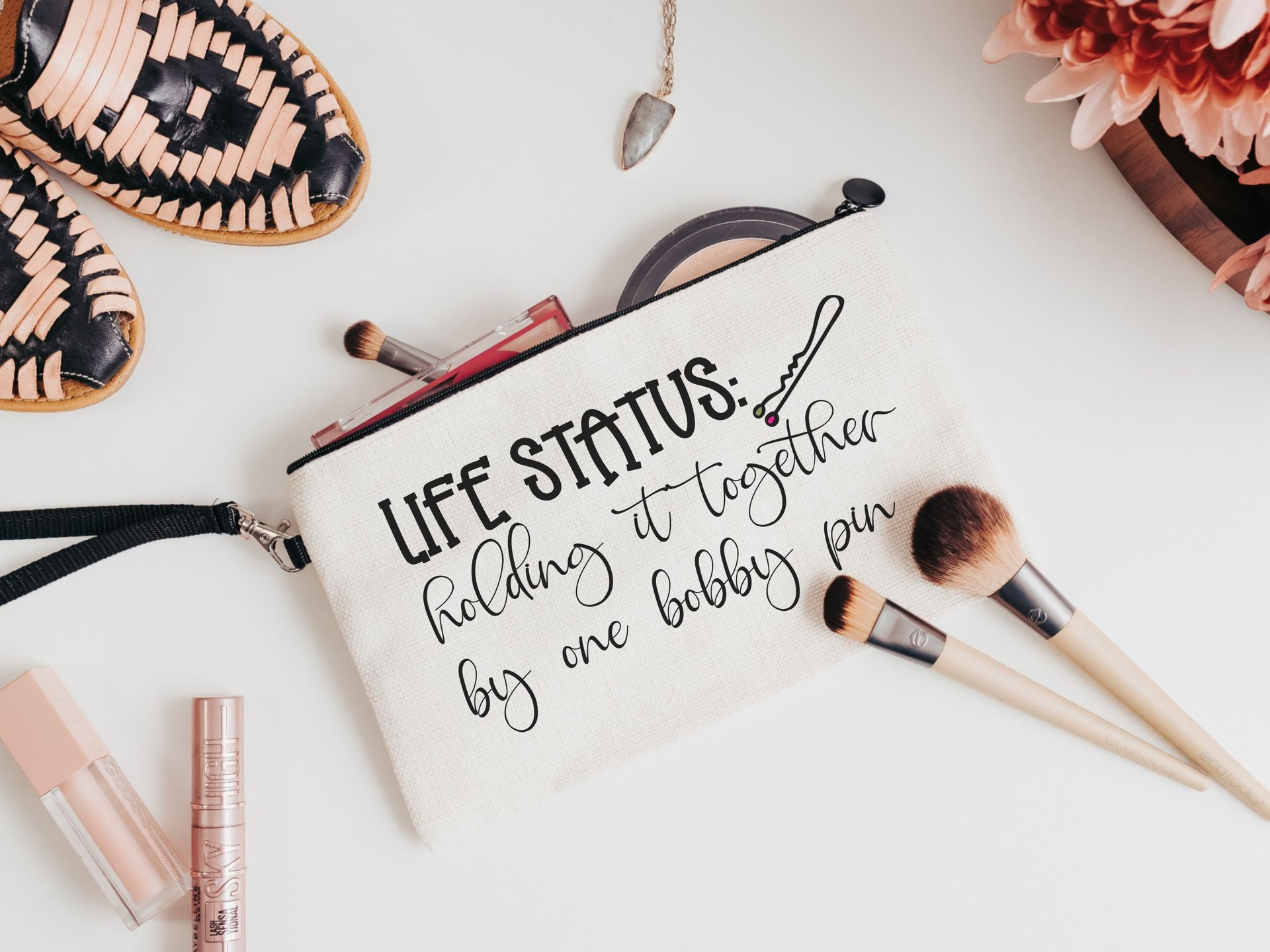 life status makeup bag
