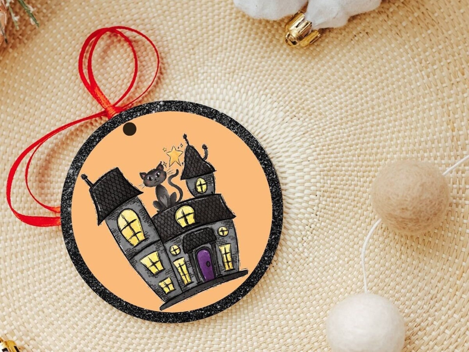 Halloween haunted house with black cat ornament