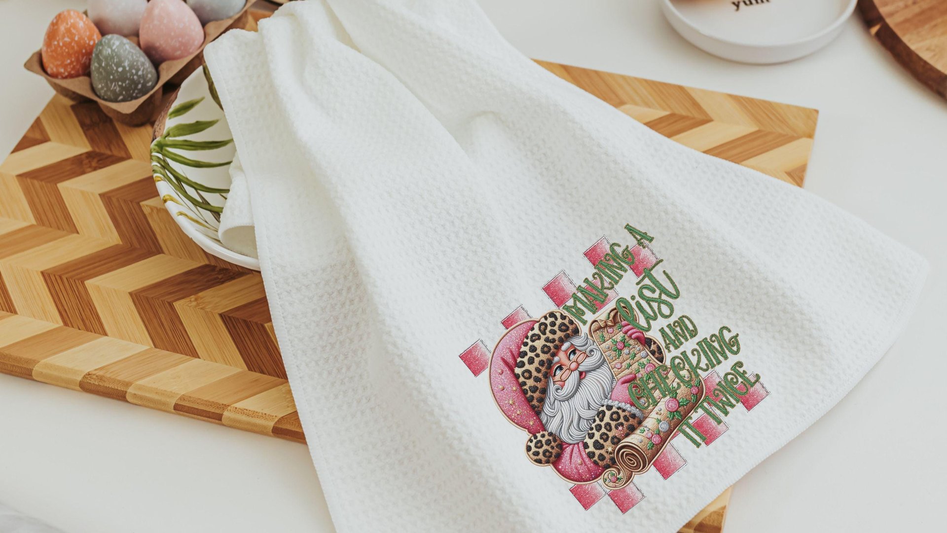 making a list and checking it twice pink Christmas throw pillows for couch, leopard print Santa Claus kitchen towels, sage green Christmas