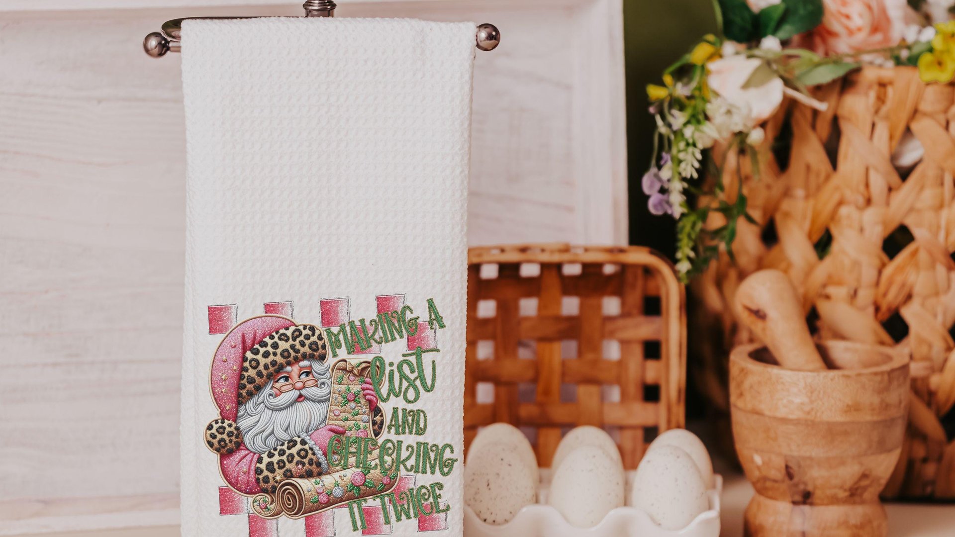 making a list and checking it twice pink Christmas throw pillows for couch, leopard print Santa Claus kitchen towels, sage green Christmas