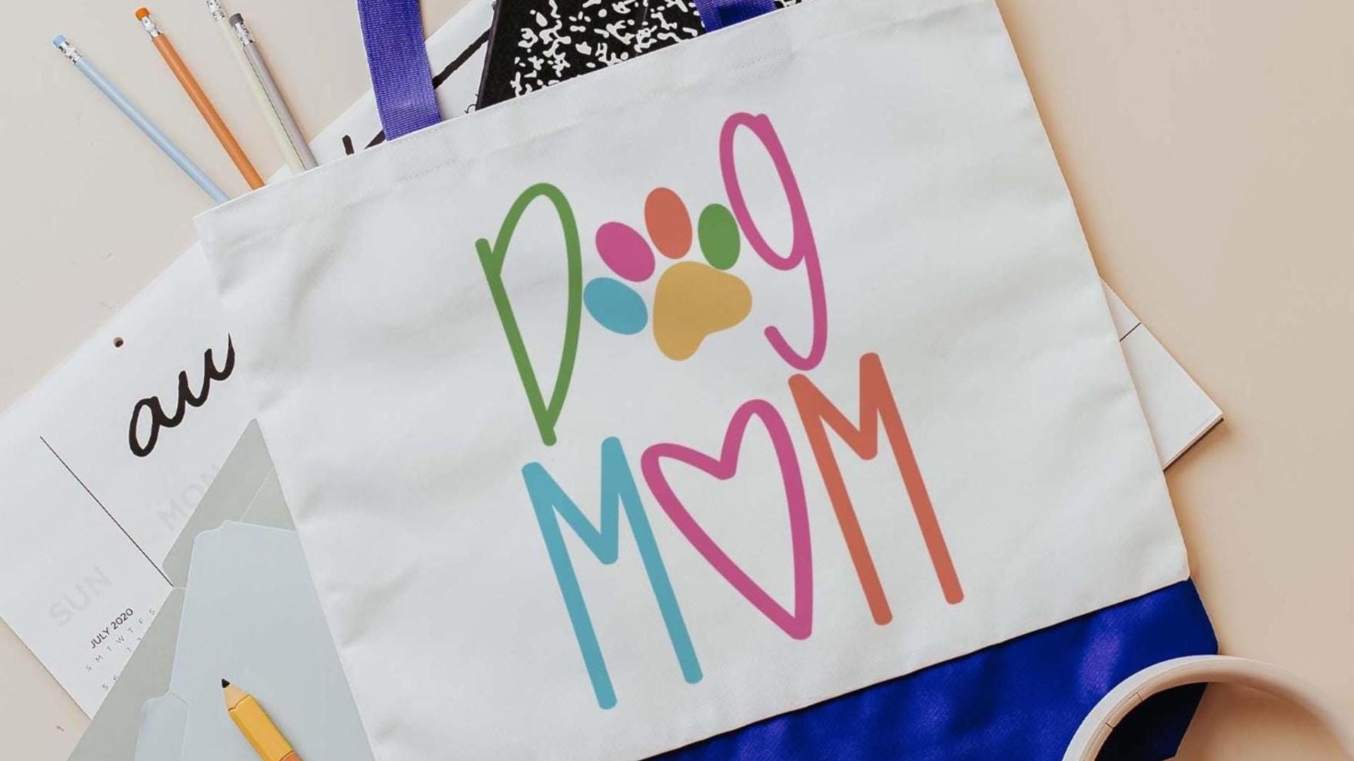 dog mom tote for women, colorful dog paw print tote bag for dog lover, popular now dog mama gifts, dog beach bags for summer, dog gifts for