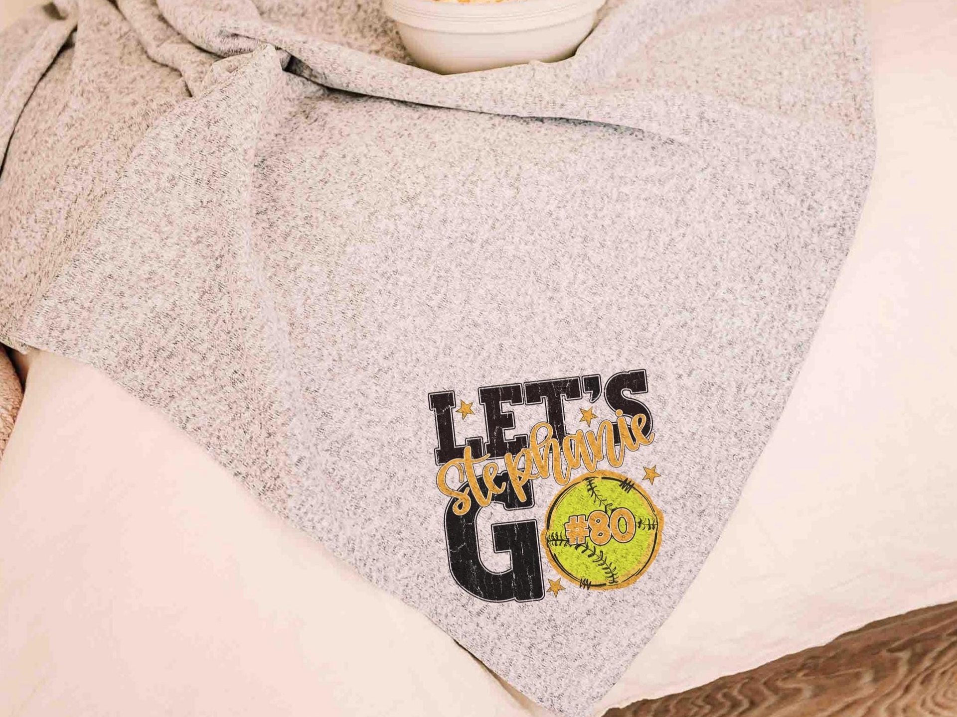 CapableByDesign personalized lets go team name and number softball blanket