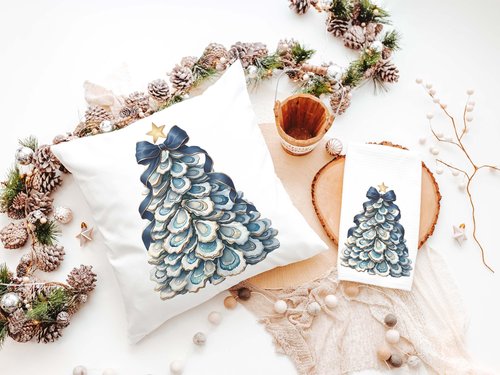 CapableByDesign oyster shell Christmas tree with navy bow pillows and matching towels