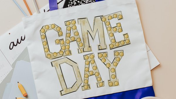 tailgate tote bag for football mom, gold school spirit items, game day gear for teachers, football tote for games, stocking stuffers for